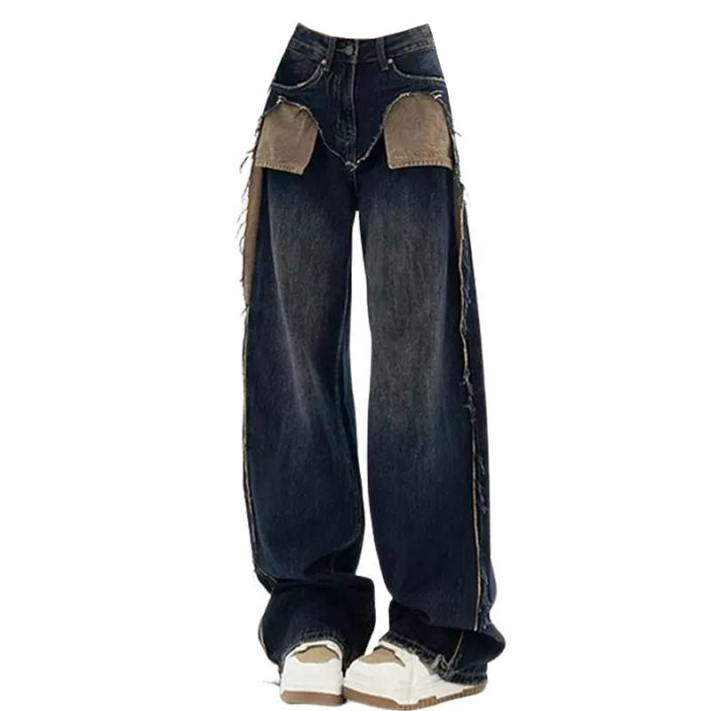 These Canyon Town Cowboy Jeans have a wide-leg cut, large contrasting front pockets, and frayed side details