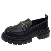 Black leather preppy loafers featuring a chunky sole and a gleaming silver chain across the vamp - boogzel clothing