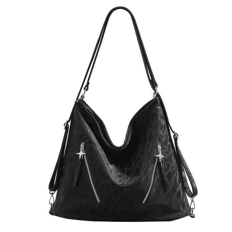 Aesthetic shoulder bag in black with a sleek design and front zipper & stars detail - boogzel clothing