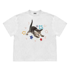 Bright t-shirt with a cute kitten graphic surrounded by colorful stars - Boogzel Clothing
