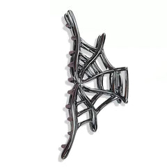 Grunge aesthetic metal hair claw with a spiderweb design