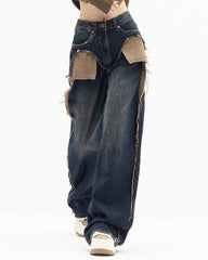 These Canyon Town Cowboy Jeans have a wide-leg cut, large contrasting front pockets, and frayed side details