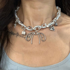 Our Coquette Chunky Necklace features a bold silver chain with bow, heart, and star pendants - boogzel clothing