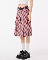 This modern kilt skirt features a plaid pattern with a pleated structure. It has a knee-length cut and a structured waistband, offering a contemporary twist on a classic design - boogzel clothing - preppy aesthetic