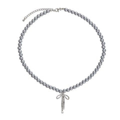 bow pendant pearl necklace boogzel clothing