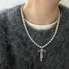 bow pendant pearl necklace boogzel clothing