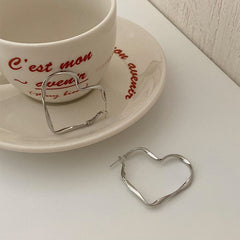 Treat yourself to a little minimalistic love with these chic Minimalist Aesthetic Heart Earrings!