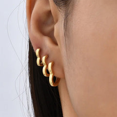 golden heart-shaped earrings boogzel clothing
