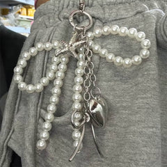 pearl bow charm keychain boogzel clothing