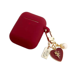 red airpods case with heart charm boogzel clothing