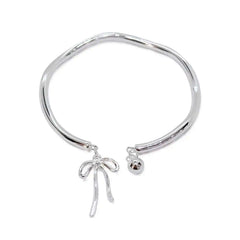 silver bow bracelet boogzel clothing