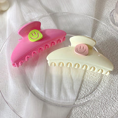 smiley face hair claw boogzel clothing