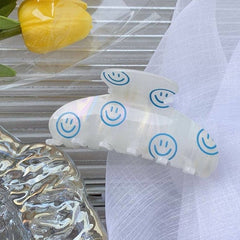 smiling face hair claw boogzel clothing