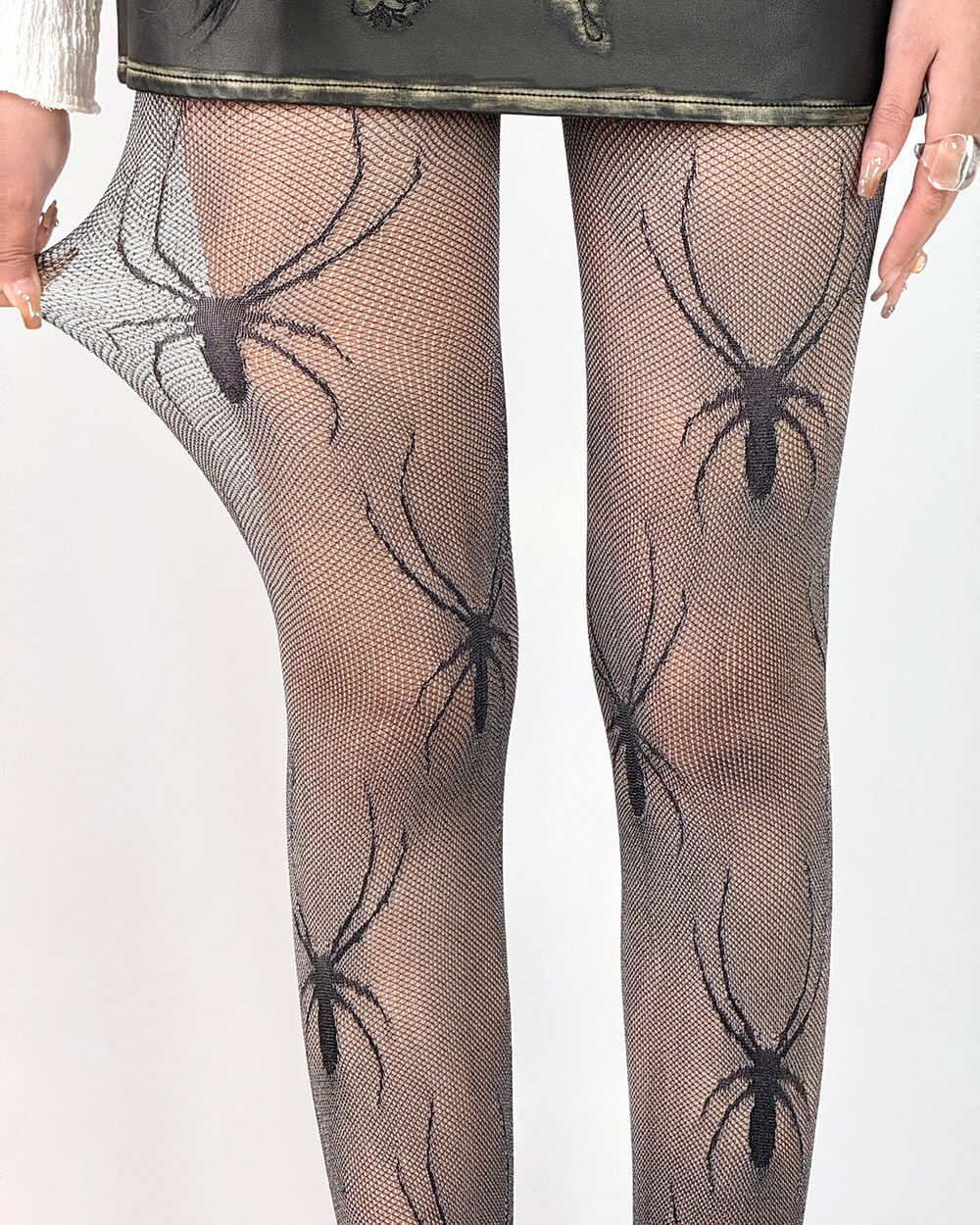 spider print fishnet tights boogzel clothing