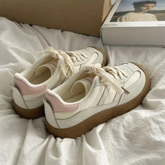 white and black stripe sneakers boogzel clothing