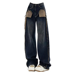 These Canyon Town Cowboy Jeans have a wide-leg cut, large contrasting front pockets, and frayed side details