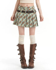 A stylish green preppy plaid pleated mini skirt featuring a high-waist design and loops for two belts. The skirt has a classic checkered pattern with a pleated structure, perfect for school outfits