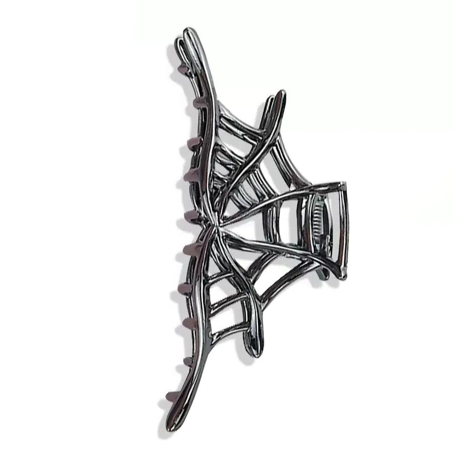 Grunge aesthetic metal hair claw with a spiderweb design