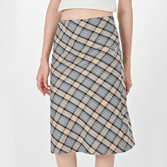 beige and black plaid midi skirt boogzel clothing
