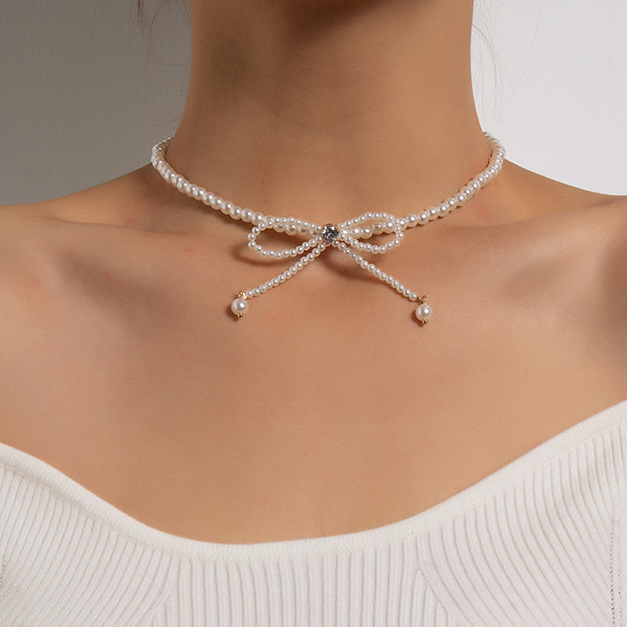 bow pearl choker boogzel clothing