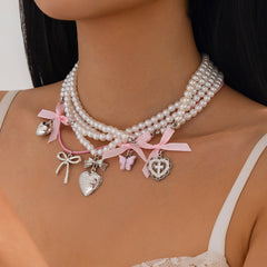 coquette pearl layered necklace set boogzel clothing