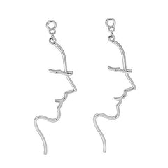 face outline earrings boogzel clothing