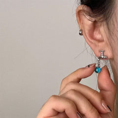 faucet shaped drop earrings boogzel clothing