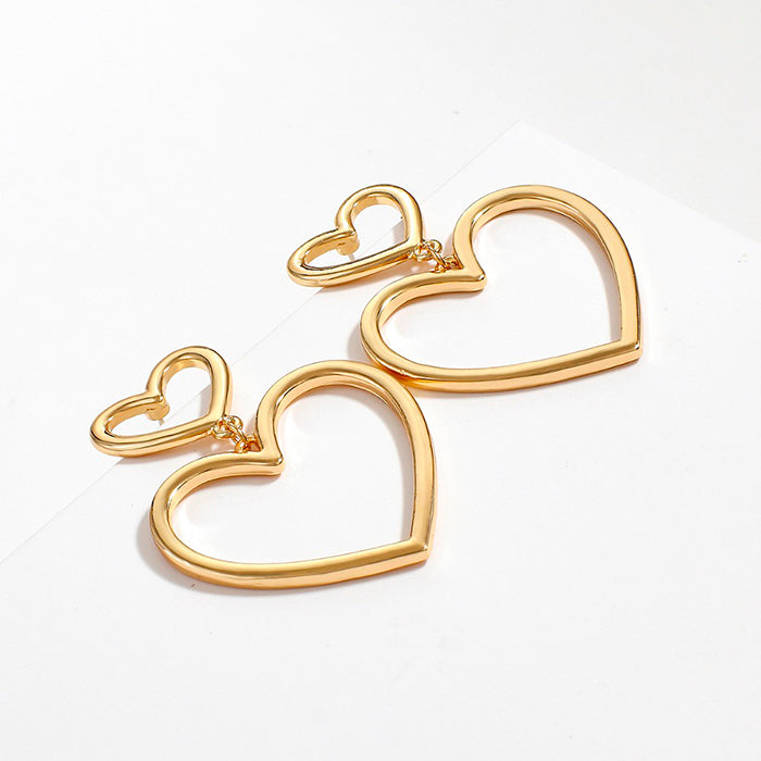 gold heart earrings boogzel clothing