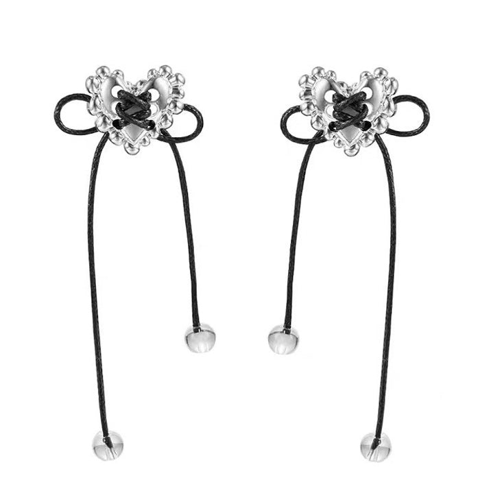 heart lace up earrings boogzel clothing