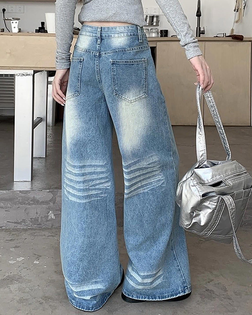 light blue washed wide leg jeans boogzel clothing