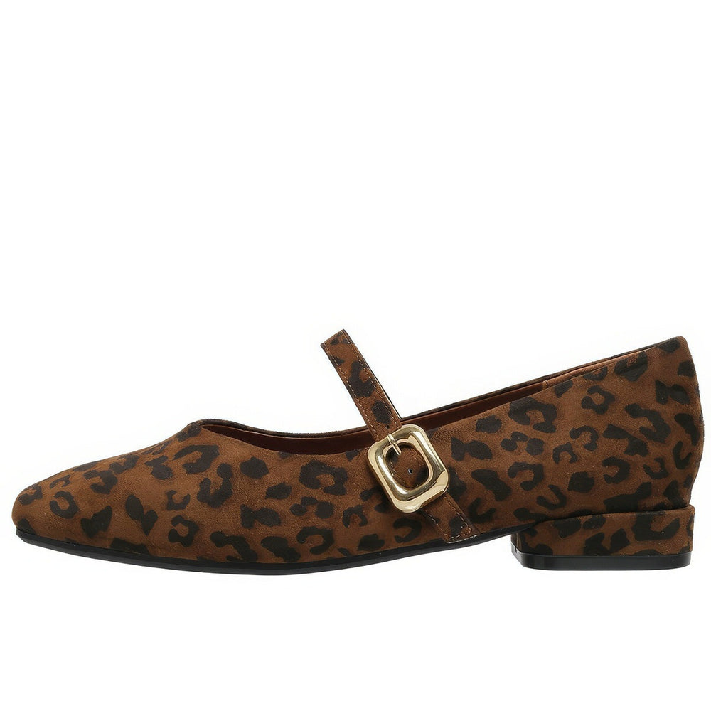 This aesthetic Mary Jane shoe featuring a square toe, low block heel, and soft suede-like surface. Designed with a slim strap and shiny gold buckle
