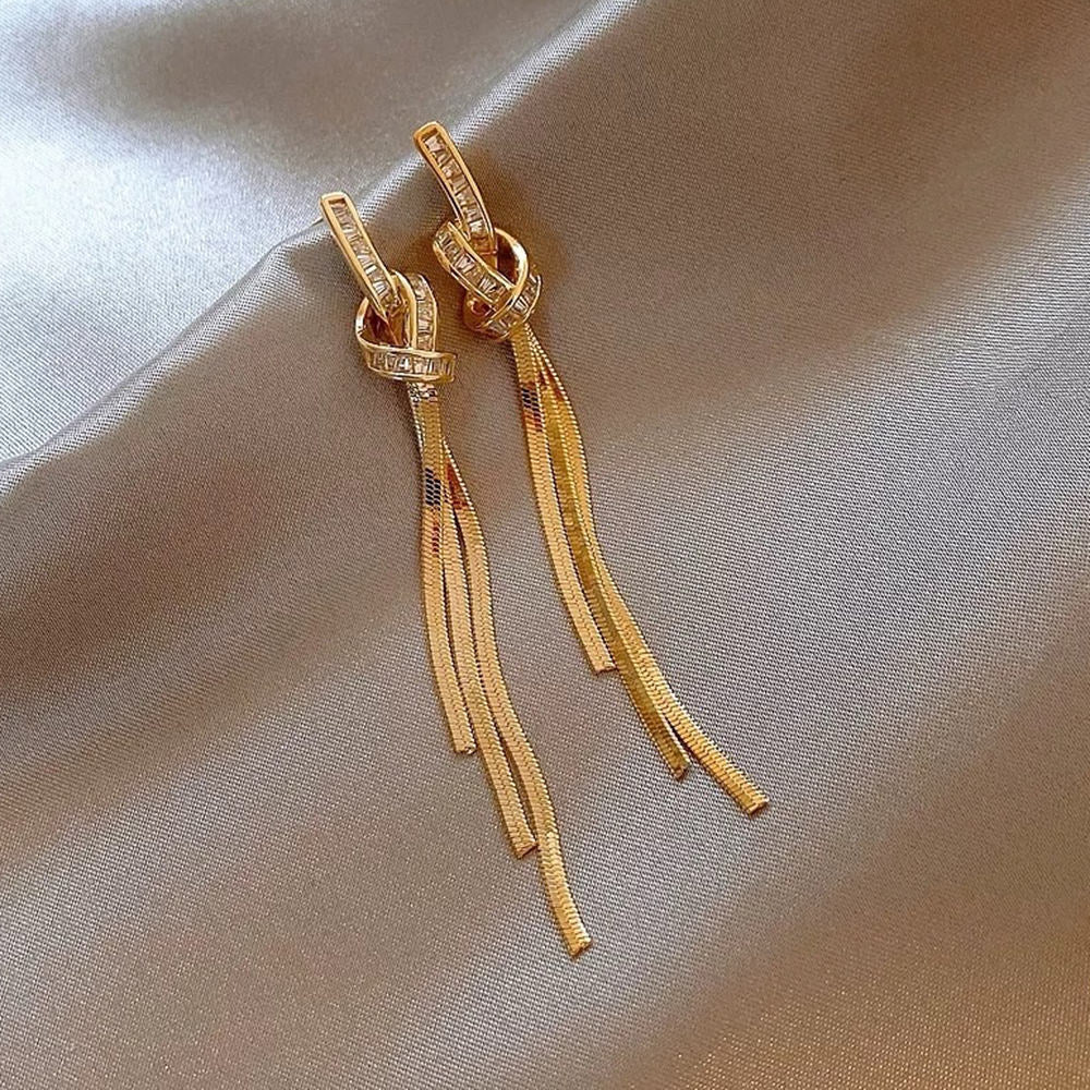 minimalist knot dangle earrings boogzel clothing