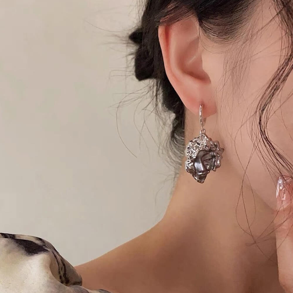 sculpted face abstract earrings boogzel clothing