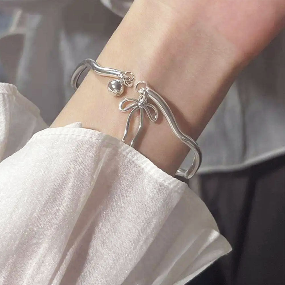 silver bow bracelet boogzel clothing