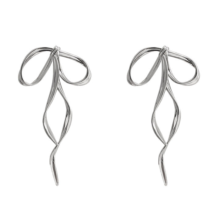 silver bow earrings boogzel clothing