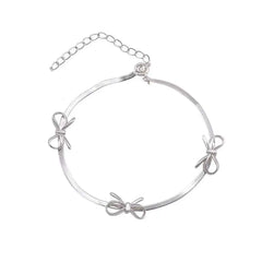 silver bows bracelet boogzel clothing