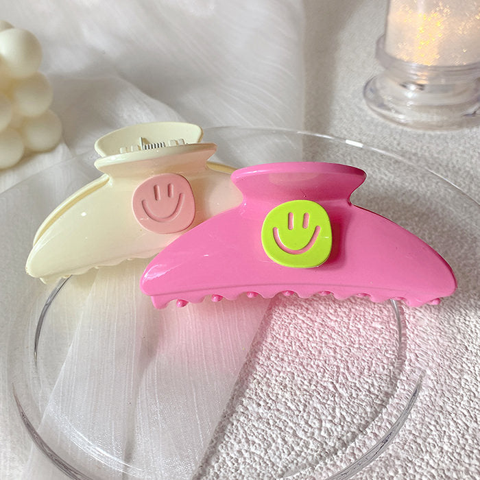smiley face hair claw boogzel clothing