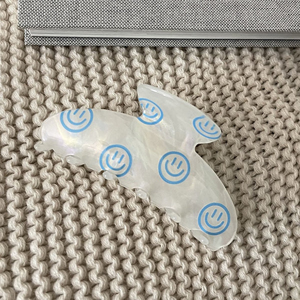 smiling face hair claw boogzel clothing