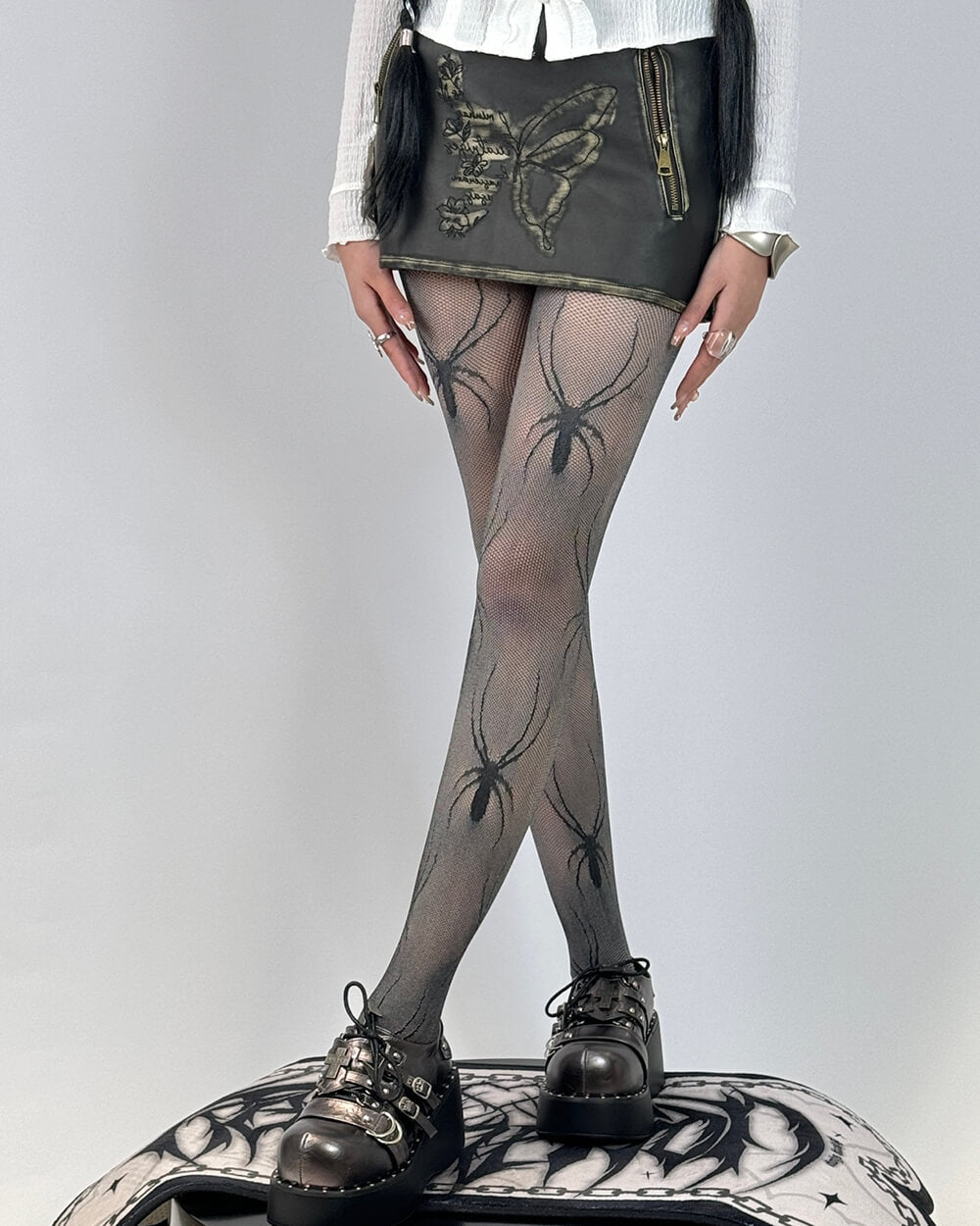 spider print fishnet tights boogzel clothing