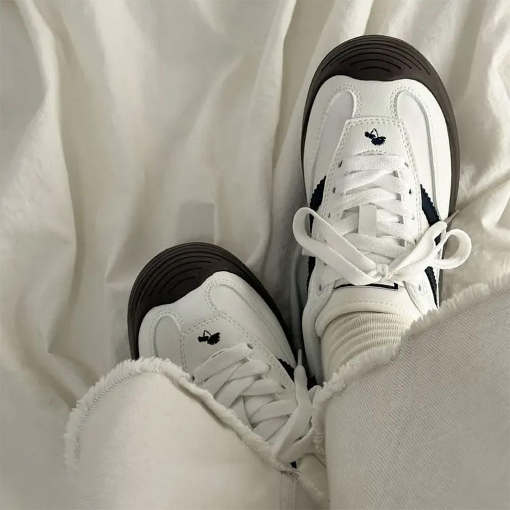 white and black stripe sneakers boogzel clothing
