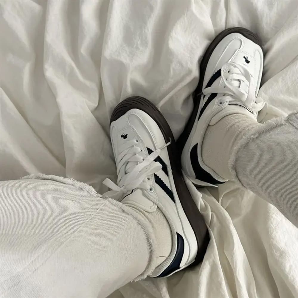 white and black stripe sneakers boogzel clothing