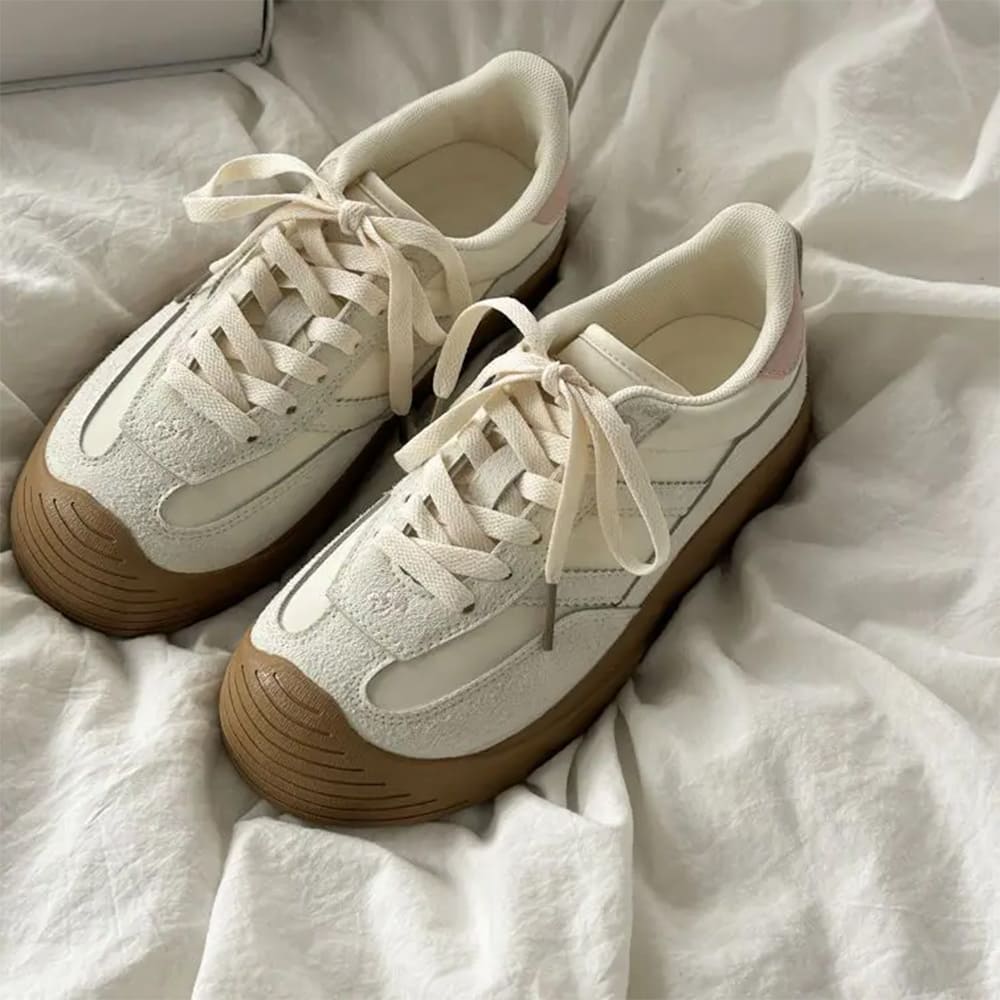 white and black stripe sneakers boogzel clothing
