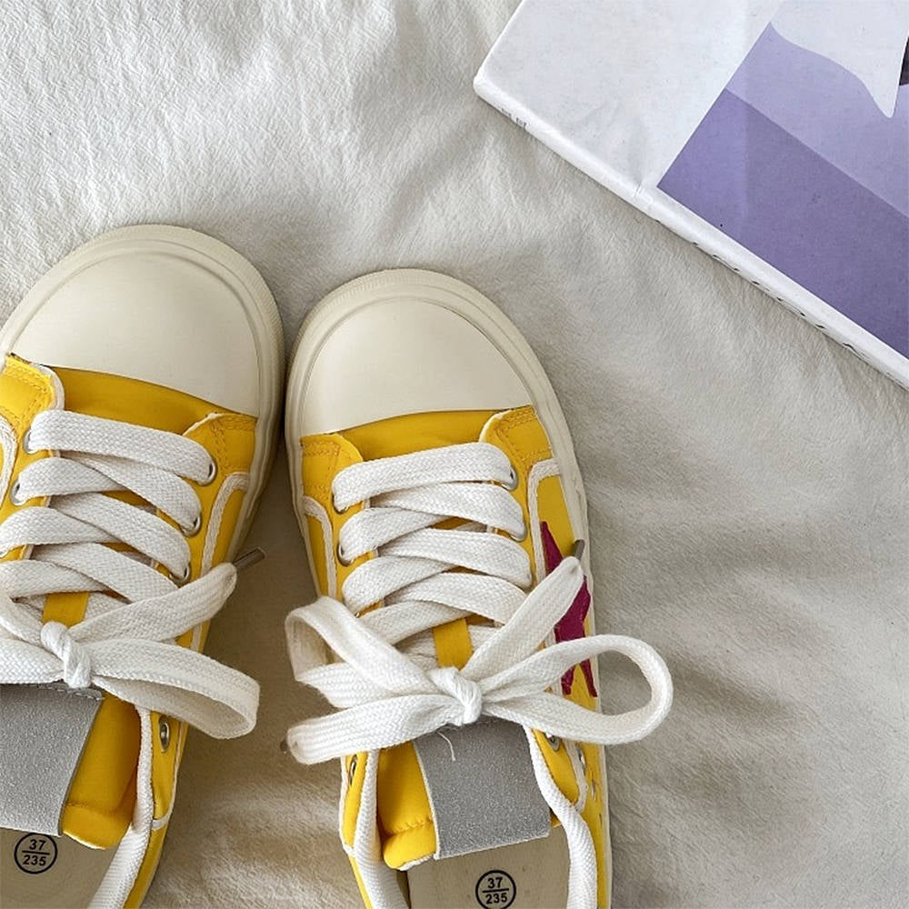 yellow and red star sneakers boogzel clothing