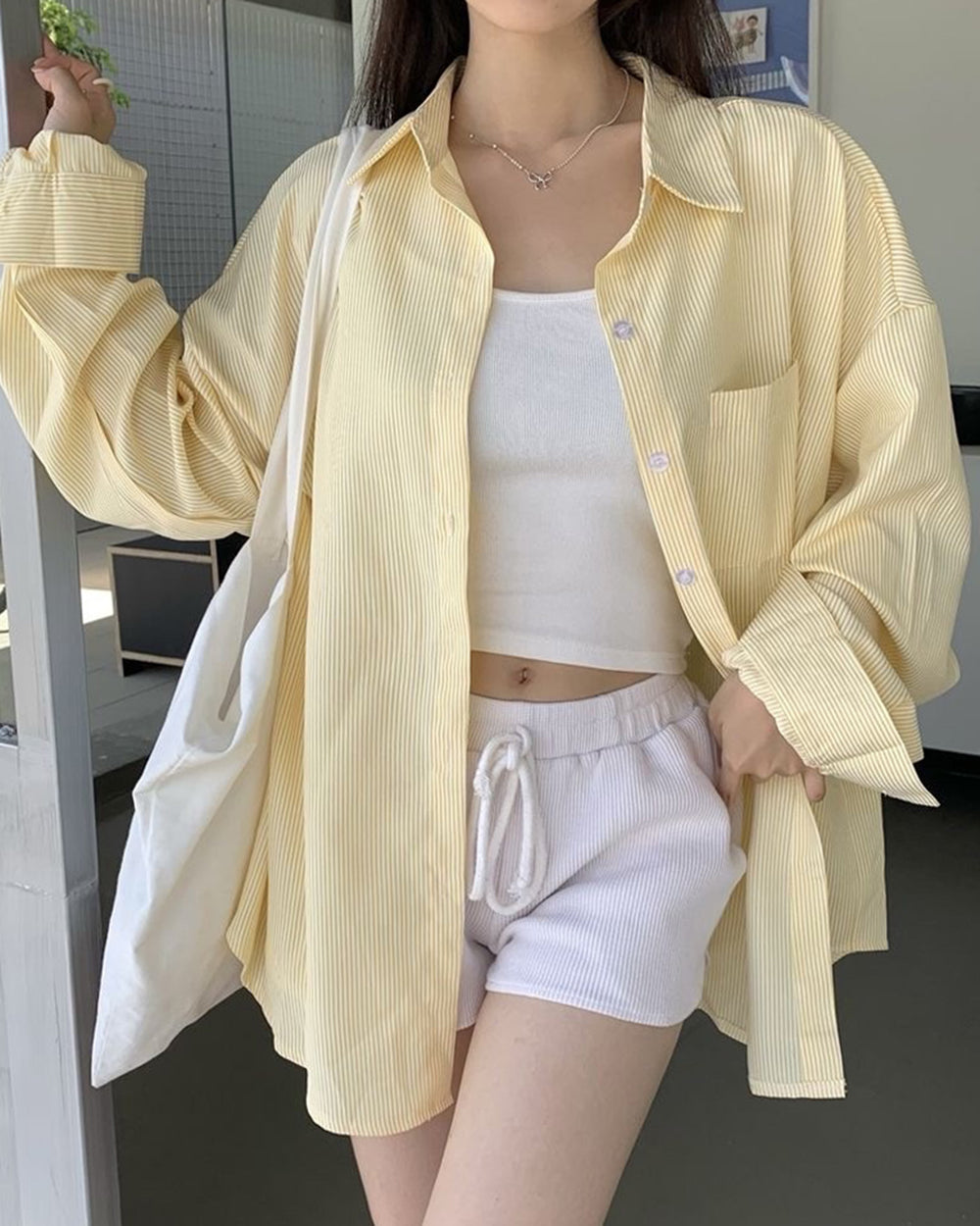 yellow striped oversized shirt boogzel clothing